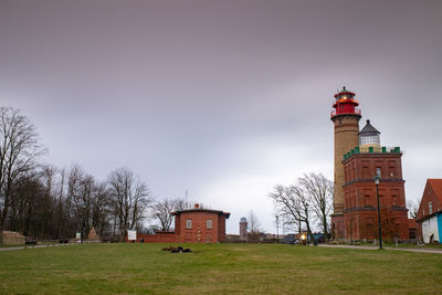 Lighthouse at kap arkona island of ruegen germany, autumn rainy morning with dark sky