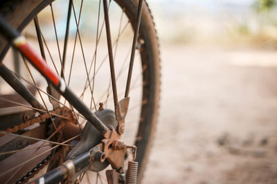 Close-up of rusty bicycle wheel