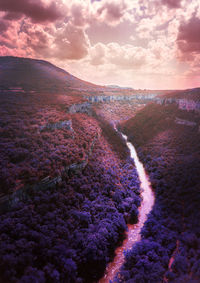 Panoramic view of purple mountains against sky