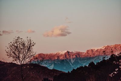 Scenic view of mountains against sky during sunset