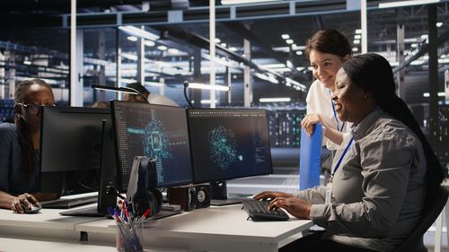 Side view of businesswoman working in office