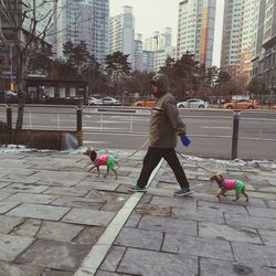 Woman walking on city street