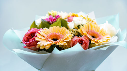 Close-up of flowers on table