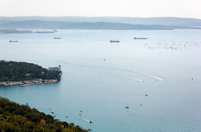 High angle view of bay against sky