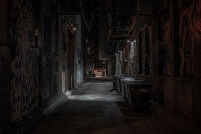 Alley in city at night