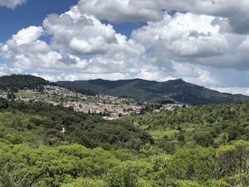 Scenic view of townscape against sky