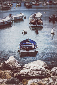 High angle view of fishing boats moored in sea