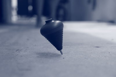 Close-up of feather on floor