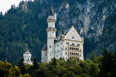 Low angle view of building against mountain