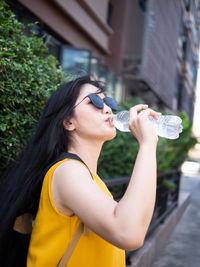 Portrait of a woman drinking glass