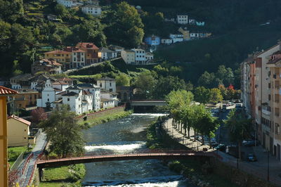 River amidst buildings in town