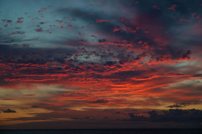 Low angle view of dramatic sky during sunset