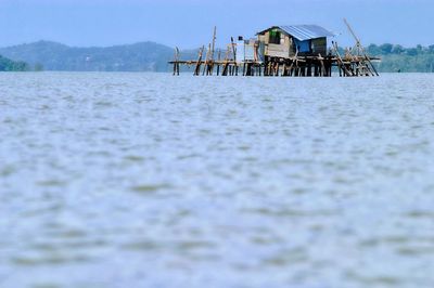 Wood hut for fishing in the middle of the sea