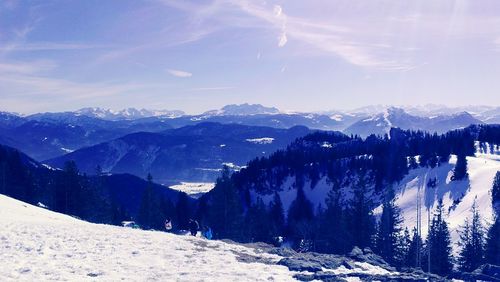 Scenic view of snow covered mountains