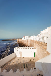 Aerial view over the old medina of asilah with the coast in morocco