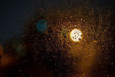 Full frame shot of wet glass window