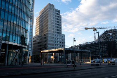 Modern buildings in city against sky