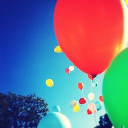 Low angle view of colorful balloons