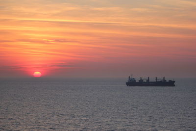 Scenic view of sunset over sea