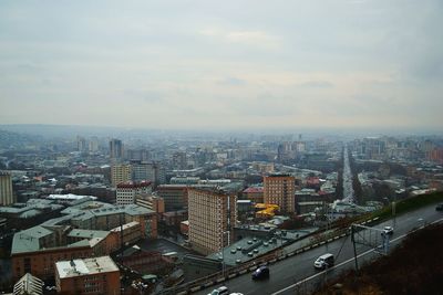 High angle view of elevated road and buildings in city