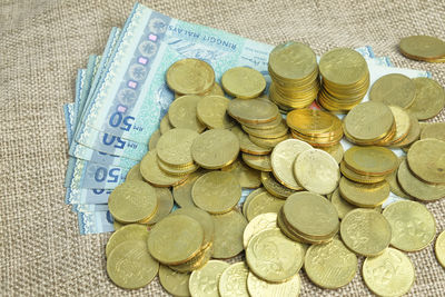 High angle view of coins