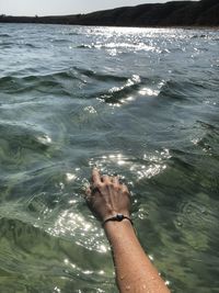Low section of person in sea