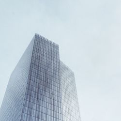 Low angle view of skyscrapers against clear sky