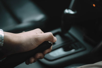Close-up of hand using mobile phone