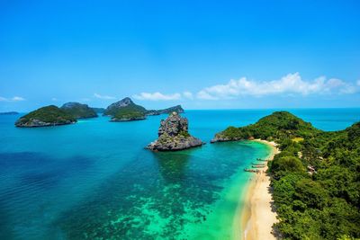 Panoramic view of sea against blue sky