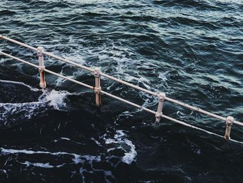 High angle view of water splashing in sea