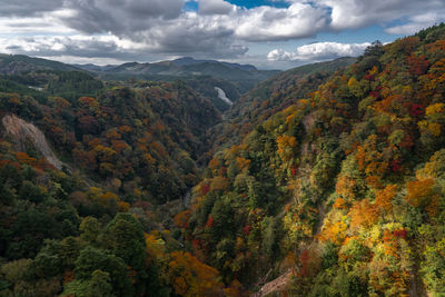 Scenic view of mountains against sky during autumn