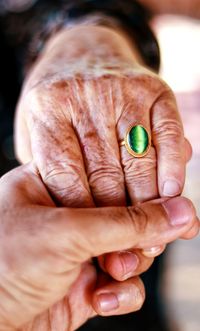 Close-up of woman holding hands