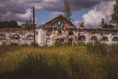 View of historic building against cloudy sky