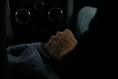 Rear view of man sitting in bus