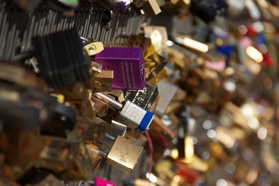 Full frame shot of love locks on metal