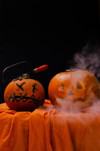 Close-up view of pumpkin against black background