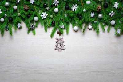 High angle view of christmas tree on wood