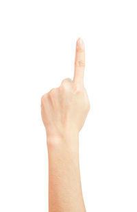 Close-up of human hand against white background