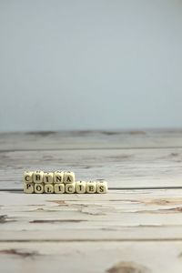 Close-up of text on table