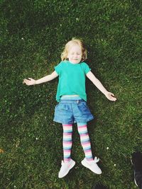 Girl standing on field