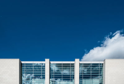 Low angle view of building against blue sky