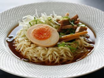 Close-up of noodle soup in plate on table