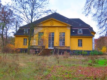 Houses with trees in background