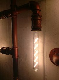 Close-up of illuminated electric lamp