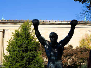 Statue against blue sky