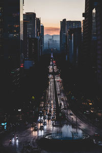 High angle view of illuminated city street at night