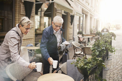 Mature couple having coffee