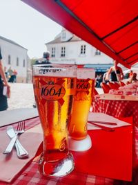 Close-up of beer glass on table in restaurant