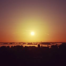 Scenic view of sea at sunset