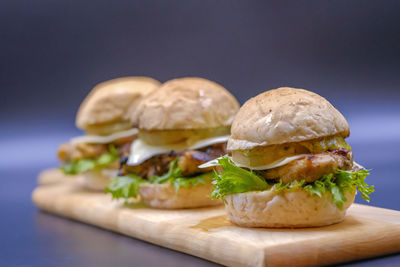 Close-up of burger on cutting board